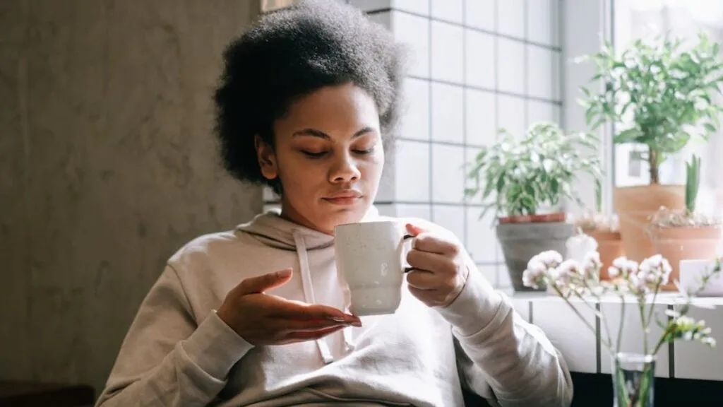 woman drinking midwives brew home recipe